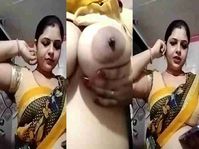 Hindi XXX Sexy Milf Bhabhi shows her big Boobs and wet shaved pussy on camera